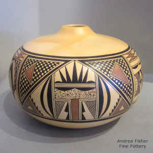 Bird element, water and geometric design on a polychrome seed pot