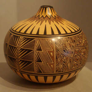 Shard and geometric design on a polychrome seedpot