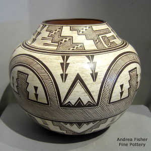 Black and white Zuni geometric design on a polychrome jar