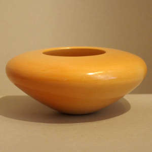 Yellow bowl, plain and polished