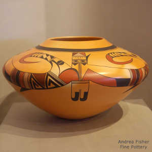 Bird element design on a yellow ware jar