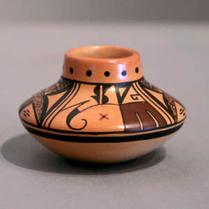 Bird element and geometric design on a miniature polychrome jar