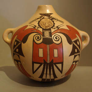 Eagle tail and geometric design on a polychrome canteen