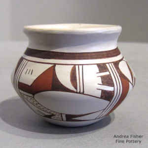 Bird element and geometric design on a miniature polychrome jar
