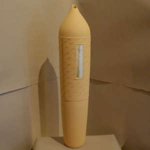 Three-panel sterling silver Shifting Sands design inlays on a tall beige seed pot