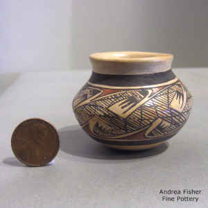 Miniature polychrome jar with migration pattern design