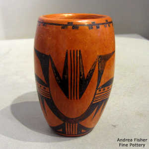 Black bird element, corn and geometric design on a red ware cylinder with fire clouds