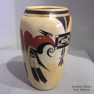 Bird element and geometric design on a polychrome jar with fire clouds