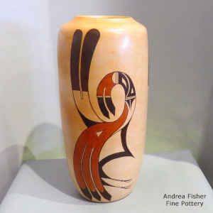 Bird element and a geometric design on a polychrome cylinder