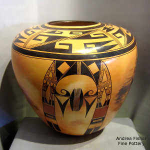 Bird element and geometric design on a polychrome yellow ware jar