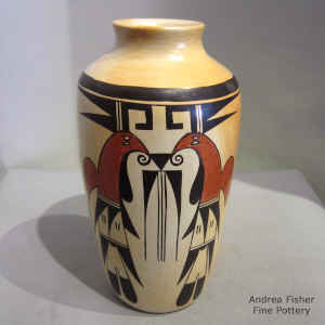 Bird element and geometric design on a polychrome jar with fire clouds