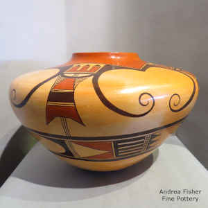 Four-direction bird element and geometric design on a polychrome jar with fire clouds