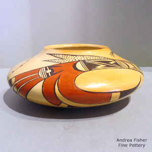 Bird element and geometric design on a polychrome jar with fire clouds