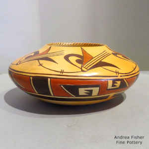 Ears of corn and geometric design on a polychrome jar with fire clouds