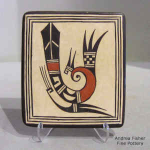 Bird element and geometric design on a polychrome tile