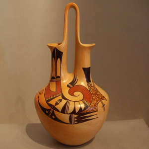 Bird element designs on a yellowware wedding vase