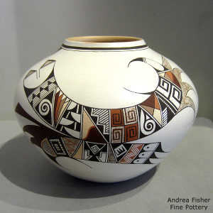 Shard, bird element and geometric design on a polychrome white ware jar