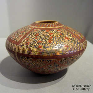Small shard and geometric design on a polychrome jar