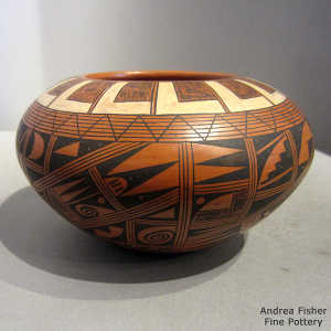 Large shard and geometric design on a polychrome red ware jar