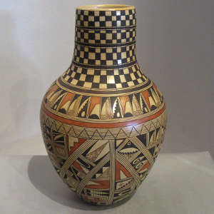 Medium shard and geometric design on a tall neck jar
