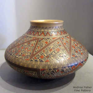Small shard design on the outside of a polychrome jar that is also polished on the inside