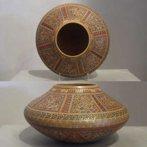 Fine shard geometric design on a polychrome jar