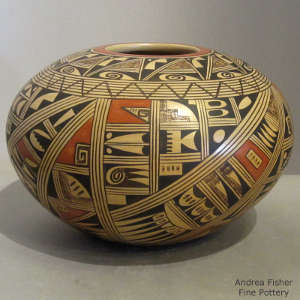 Black and red medium shard design on a yellowware jar