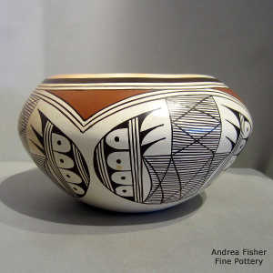 Migration pattern, bat wing and geometric design on a polychrome white war jar