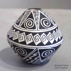 Awatovi star, Jornada Mogollon spiral, lock-and-keys, fine line and geometric design on a miniature black and white jar