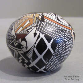 Lizard, corn plant and geometric design on a miniature polychrome seed pot