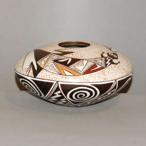 Lizard and geometric design on a polychrome whiteware jar