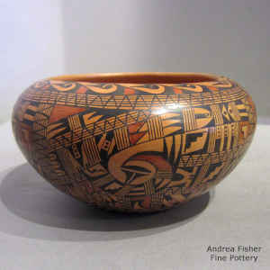Polychrome jar decorated with a bird element, small shard and geometric design