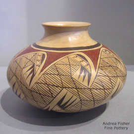 Polychrome jar with a flared lip and decorated with a migration pattern design and fire clouds