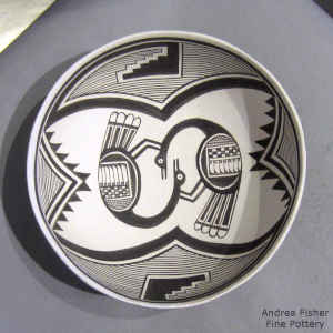 Black and white bowl with cranes, kiva step and geometric design
