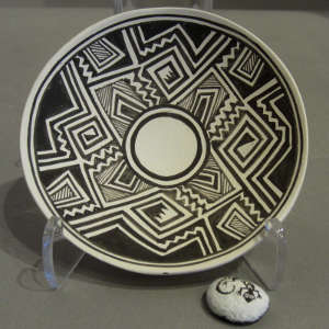 Geometric design on a miniature black and white plate