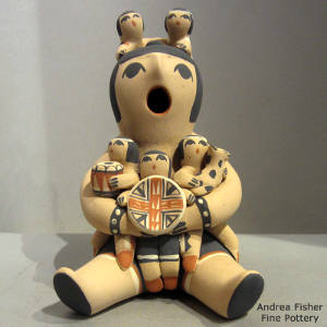 Five children and a cat on a grandmother storyteller