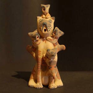 Four puppies on a dog storyteller