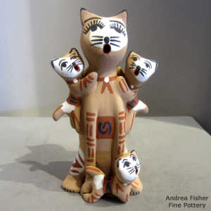 3 kittens on a feline storyteller