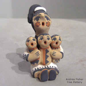 Three children on a grandmother storyteller