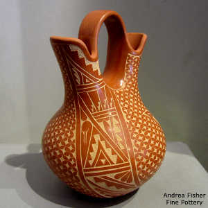 Sgraffito kiva step, snowflake and geometric design on a red wedding vase