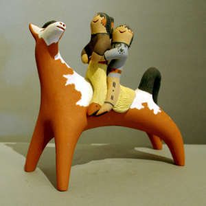 Two children on a horse