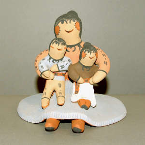 Two children on a grandmother storyteller