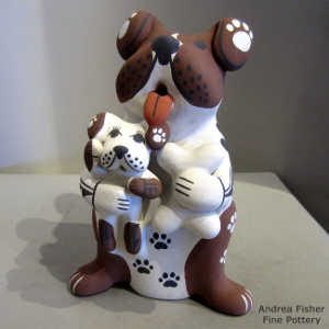 A puppy and a bone held by a canine storyteller