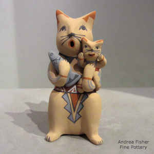 Kitten and a fish on a feline storyteller