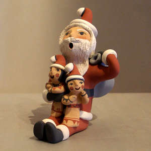 2 children on a Santa storyteller