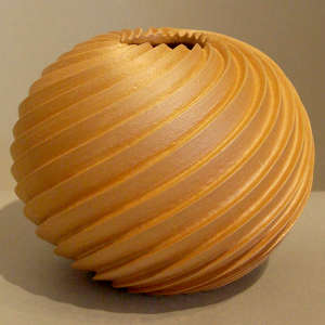 Organic opening on a micaceous cut spiral melon pot