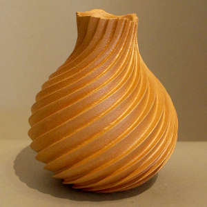 Neck and organic opening on a swirl cut melon jar