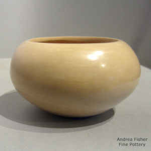 Polished buff-colored bowl