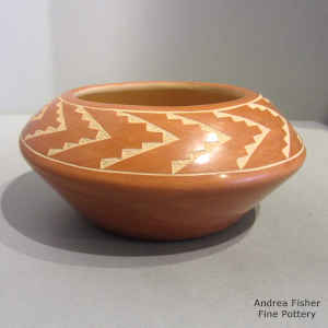 Sgraffito kiva step geometric design on a polished red bowl