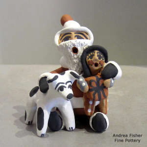 One child and a puppy on a Santa Claus storyteller